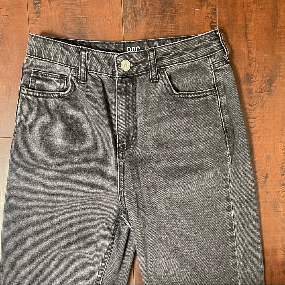 BDG ‘Mom’ jeans in black. Waist is 26”, length is 32”.